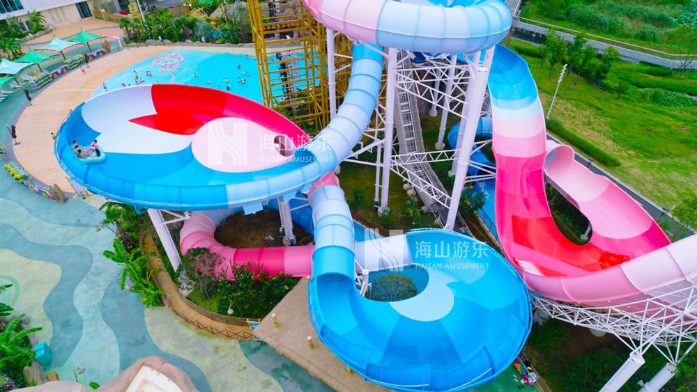 双重风暴，极致竞速——星际盘旋+巨浪翻滚组合引爆水乐园刺激体验